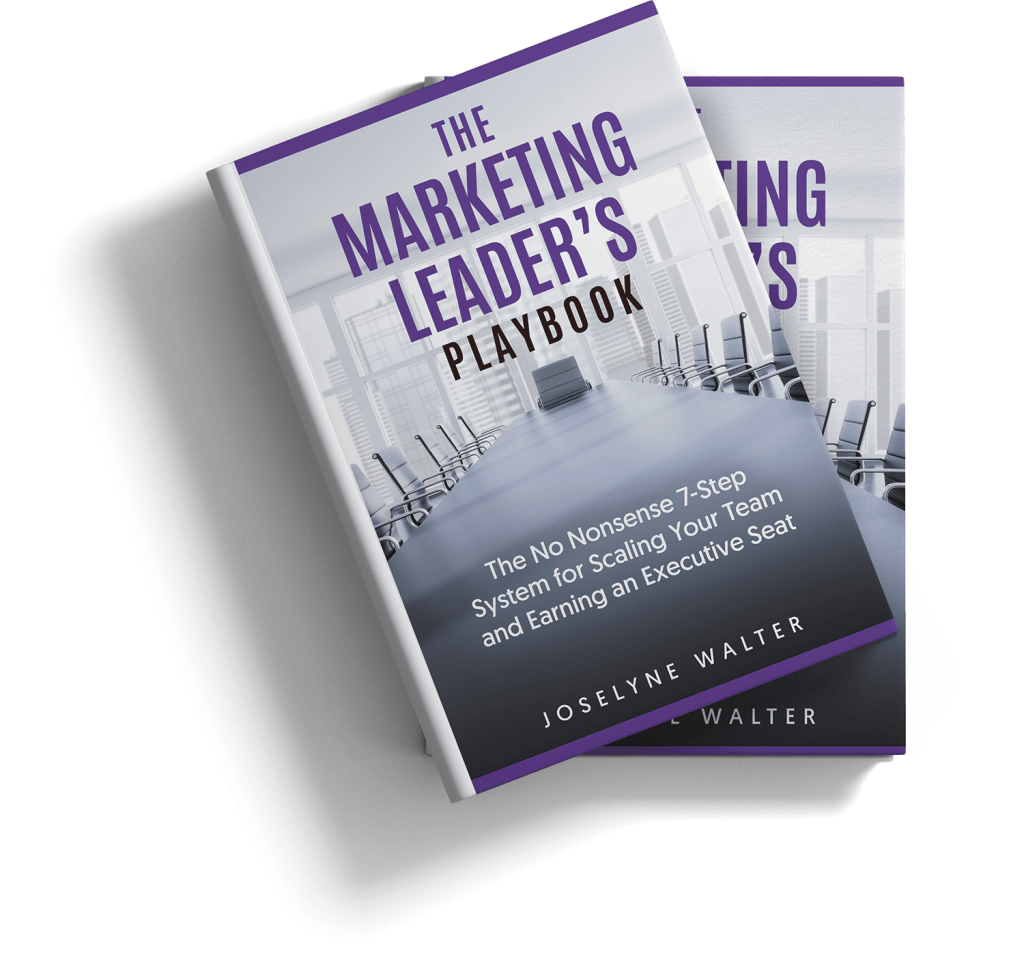 Stacked copies of The Marketing Leader’s Playbook by Joselyne Walter