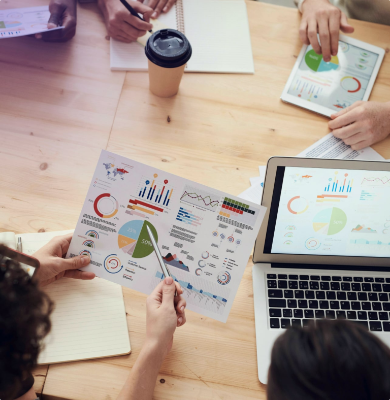 Business team analyzing data and reports